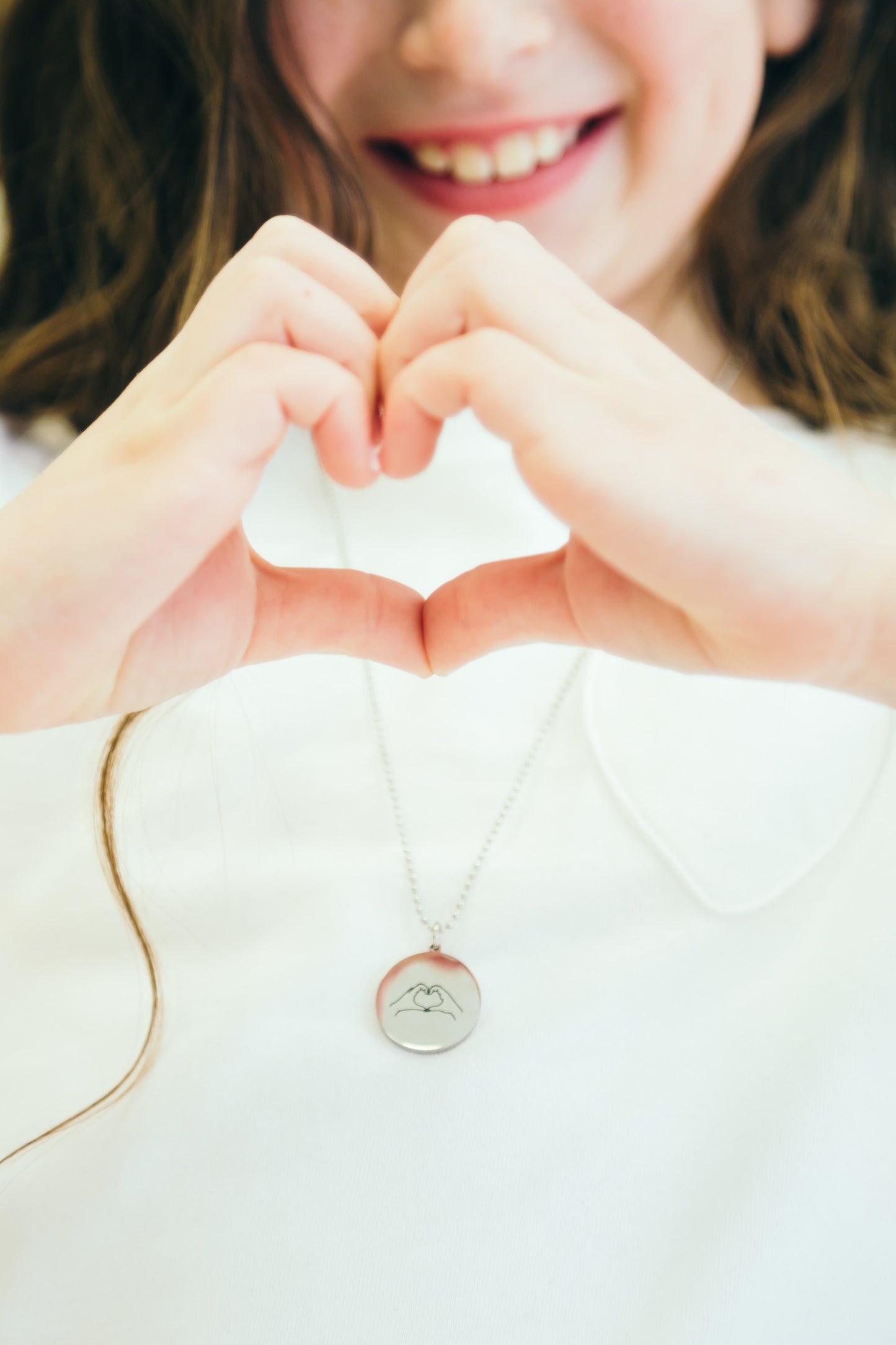 Our Girls “Heart Hands” hand